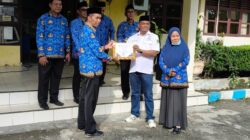 Kades Lestari Terima Penghargaan atas Dedikasi dan Kedisiplinan dalam Upacara HKN